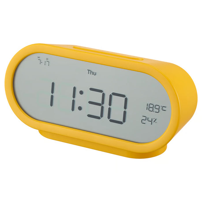 IKEA RÖDSTRÄFSE yellow alarm clock with hygro-thermometer, front view on white background #10620472