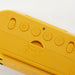 Close-up of IKEA RÖDSTRÄFSE yellow alarm clock buttons and large illuminated screen