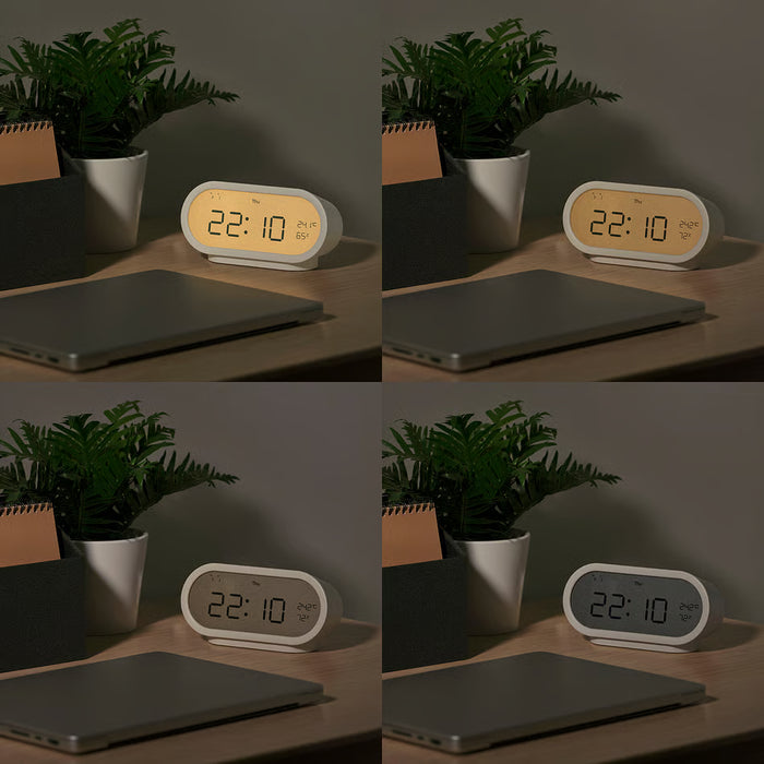 Four angle views of yellow digital clock on desk with laptop and plant