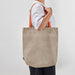  IKEA ROMELSÖN foldable bag worn over shoulder lifestyle use beige patterned