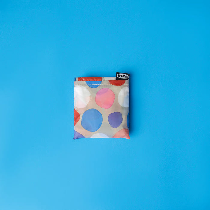  IKEA ROMELSÖN multicolour carrier bag laid flat showing compact folded size