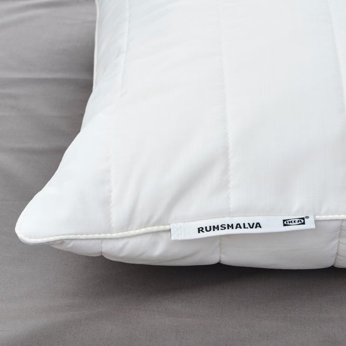 Close-up of the IKEA RUMSMALVA Pillow, showcasing its ergonomic shape and soft fabric-50446758