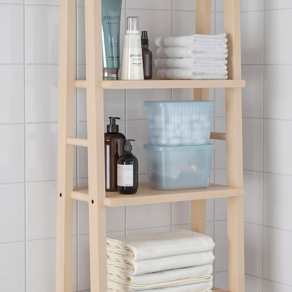 IKEA RYKTA transparent storage boxes with lids on bathroom shelf alongside towels and bottles