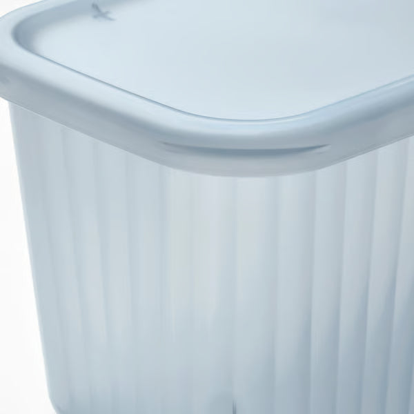 IKEA RYKTA storage box with lid close-up showing ribbed sides semi-transparent finish and secure-fit lid