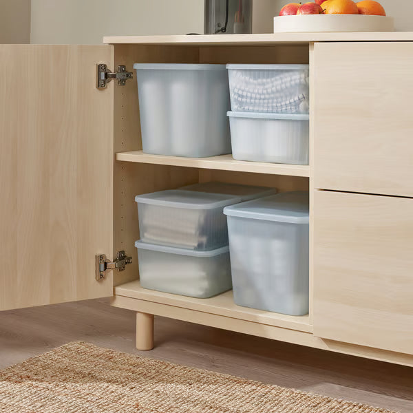  IKEA RYKTA grey-blue storage boxes with lids stacked on two shelves of wooden cabinet showing stackable design