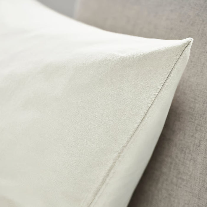 IKEA SANELA off-white cushion cover showcasing smooth stitching and soft velvet finish