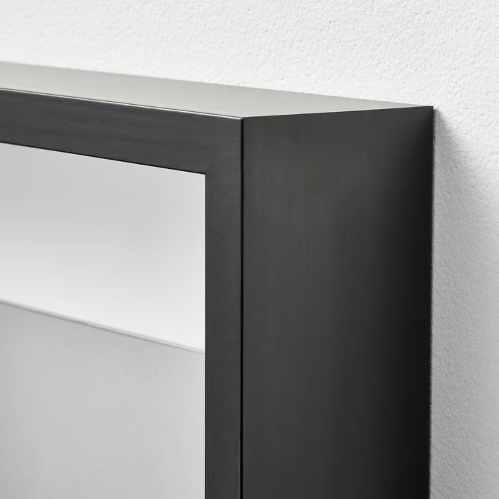  IKEA SANNAHED black frame close-up showing fibreboard and paper foil matte black finish