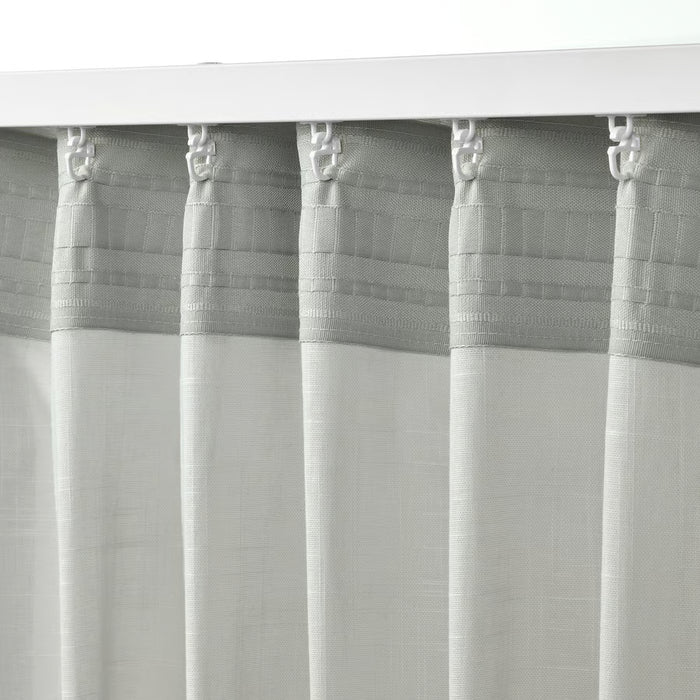 IKEA SILVERLÖNN sheer curtains with white hooks for easy hanging and adjusting