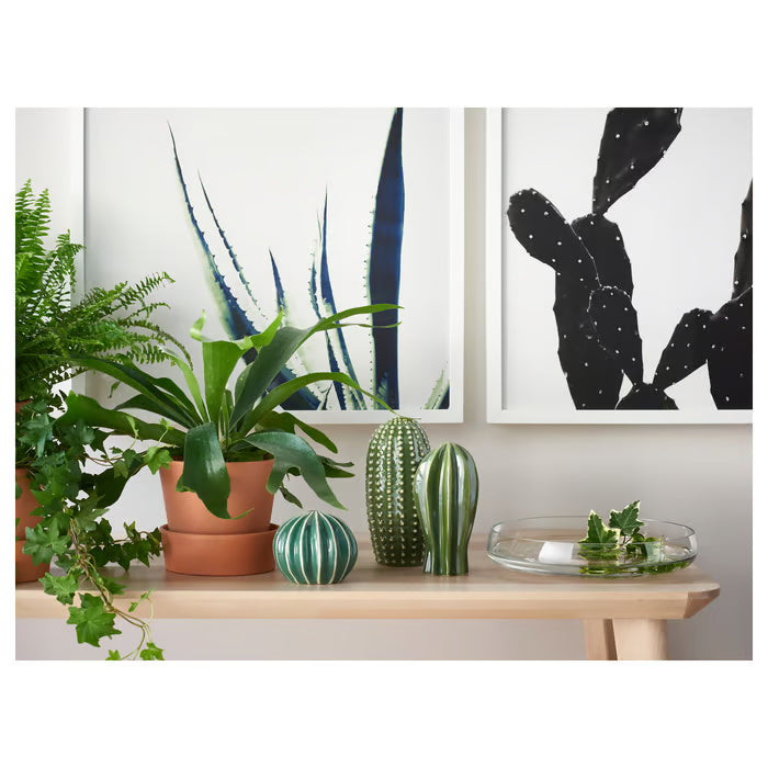 IKEA SJÄLSLIGT green ceramic cacti styled on a shelf with real plants and cactus print artwork