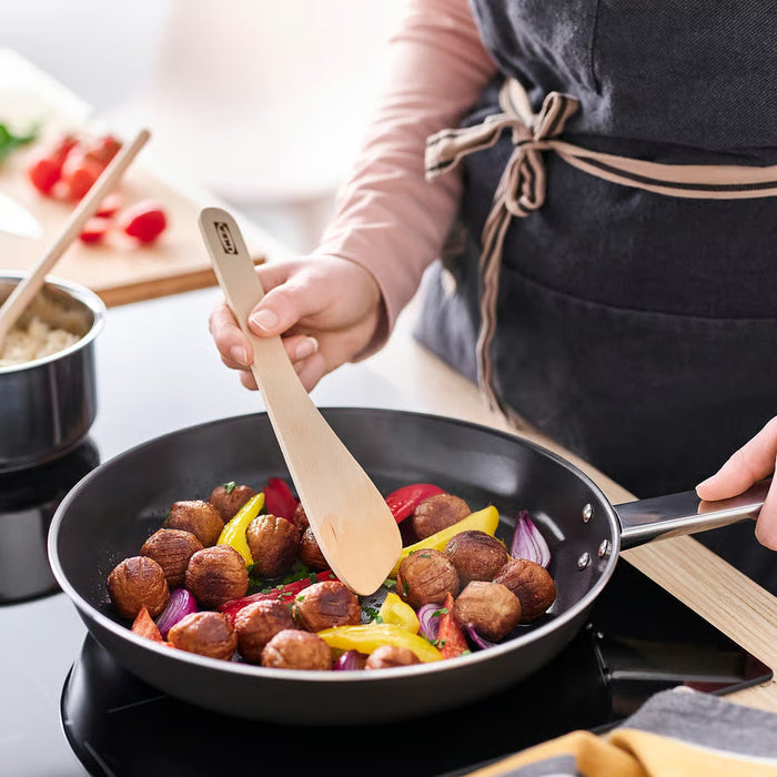 IKEA SJÖKEX birch utensil set in use in a kitchen cooking context