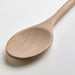 Close-up of IKEA SJÖKEX birch spatula angled edge detail natural wood grain