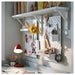 IKEA SKÅDIS white container in home office setting holding pencils and scissors on pegboard