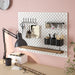 IKEA SKÅDIS containers on pegboard in an organised home office desk setup
