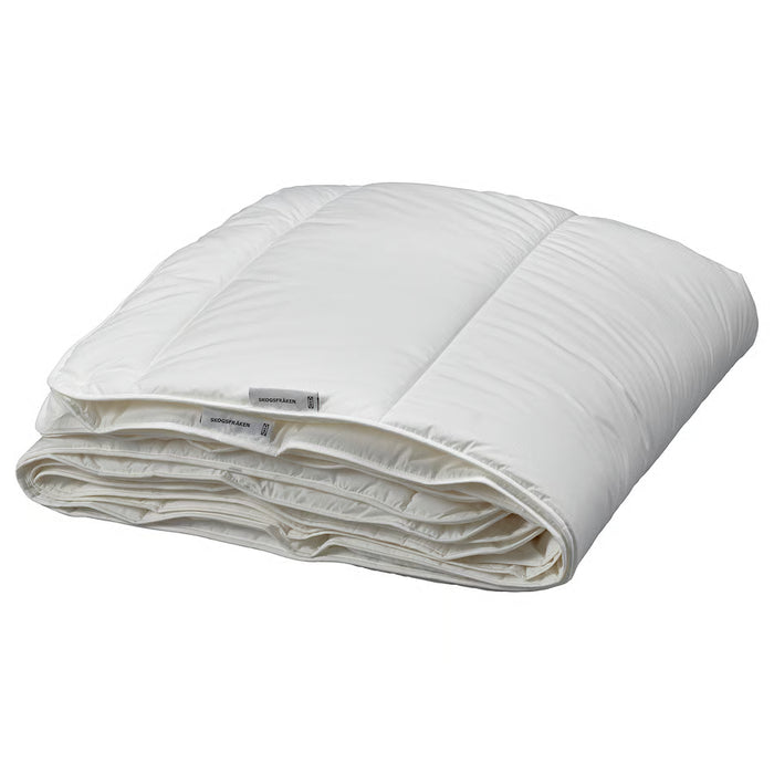 IKEA SKOGSFRÄKEN all seasons duvet white 150x200 cm spread on double bed showing full size #70618640