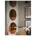 IKEA SKOGSGRÄNSEN mirror wavy bottom edge close view on white wall