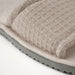 IKEA SKOVELSJÖN beige slipper top-down view highlighting waffle-textured fabric