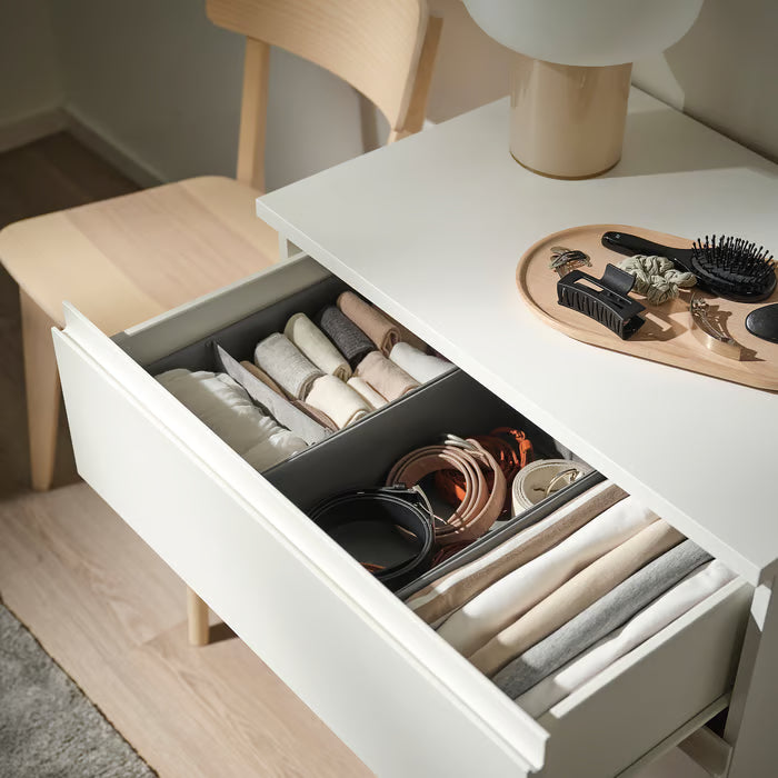 IKEA SKUBB dark grey boxes set of 3 arranged inside open wardrobe drawer with folded clothes