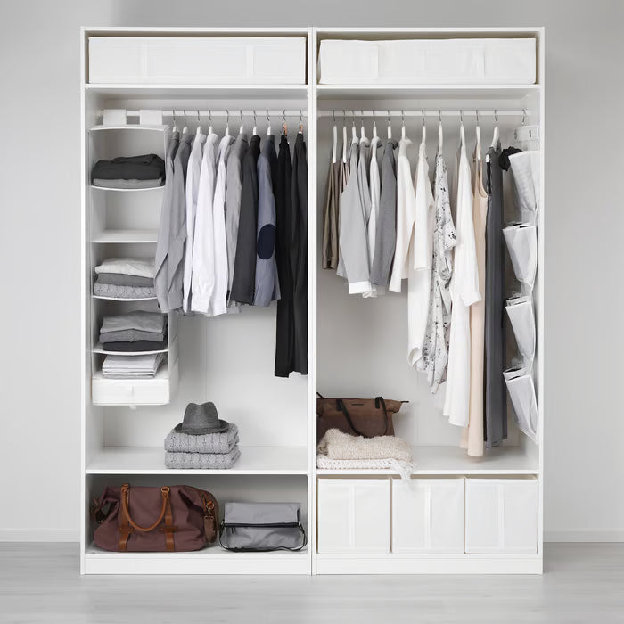 Full wardrobe view with multiple IKEA SKUBB boxes organising clothes and accessories
