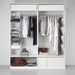 Full wardrobe view with multiple IKEA SKUBB boxes organising clothes and accessories