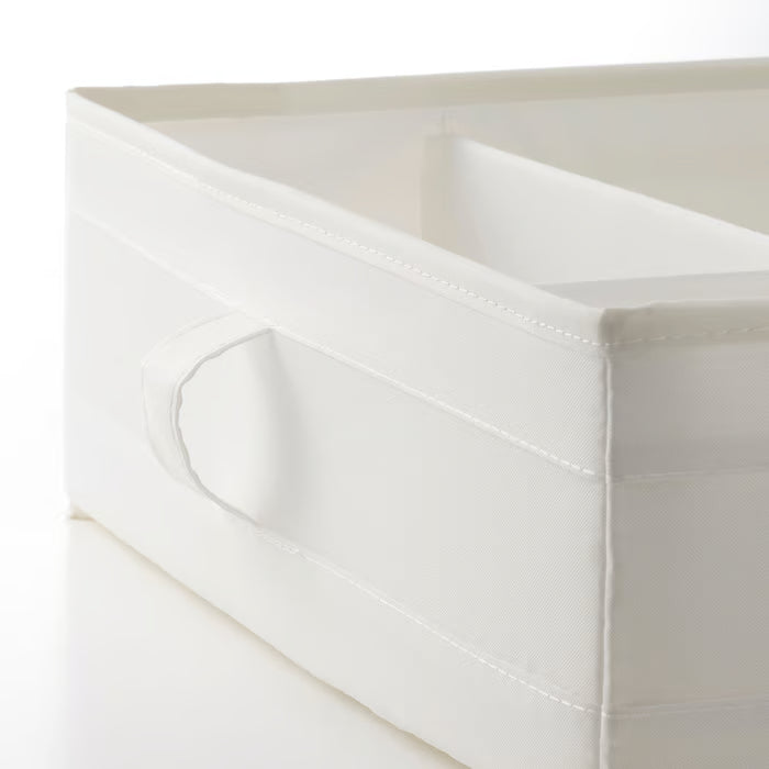 IKEA SKUBB white fabric organiser box folded flat showing zipper base and carrying handles