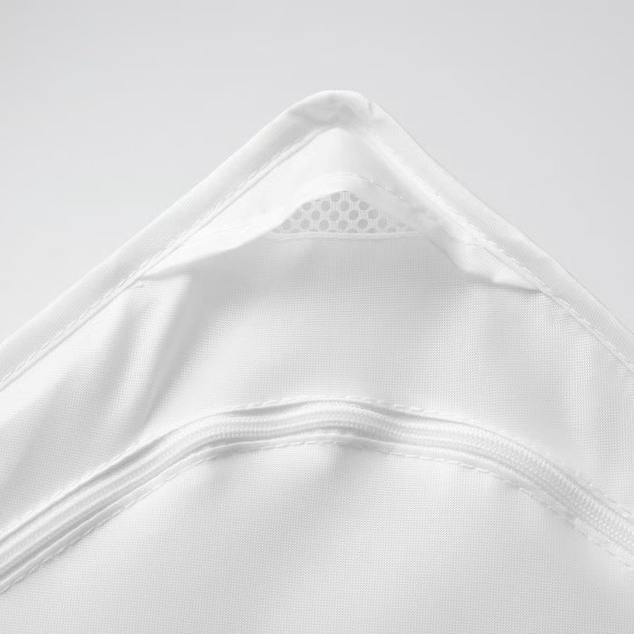 Close-up of IKEA SKUBB white storage case corner showing ventilation mesh and reinforced stitching