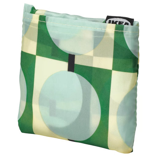 KEA SKYNKE pale yellow bag unfolded showing full size and multicolour print detail