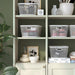 IKEA SLÅTTERÄNG off-white mesh storage basket on shelf