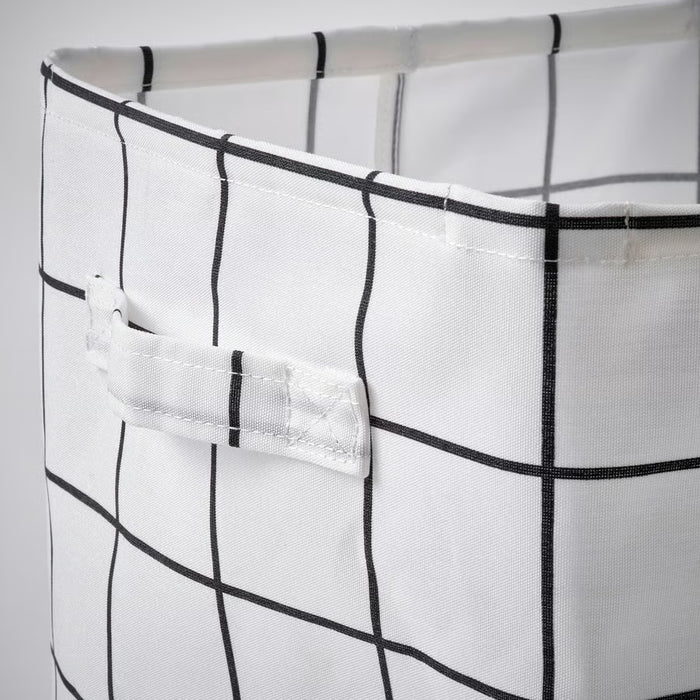 IKEA SLÄTTERVALL basket with black trim handles mounted on shelf