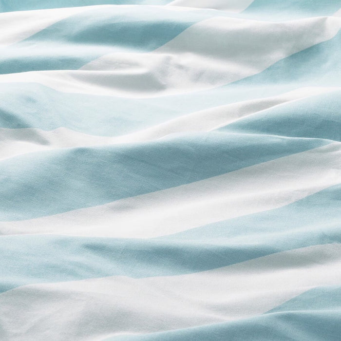 Close-up view of the light blue and white striped fabric of the SLÖJSILJA duvet cover-30561400