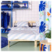 A neatly made bed with the IKEA SLÖJSILJA Duvet Cover and Pillowcase set in light blue and white stripes-30561400