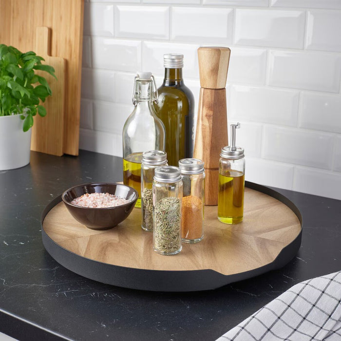 IKEA Lazy Susan with adjustable levels, providing customizable storage options for a variety of kitchen items.