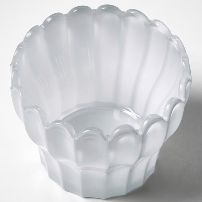 Close-up of IKEA SMÅNÄCKROS white glass tealight holder with scalloped petal edges