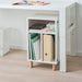 White shelf unit with open compartments, suitable for organizing various items