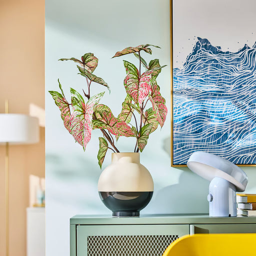 IKEA SMYCKA artificial caladium stem standing in tall vase on console table home decor setting