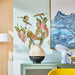 IKEA SMYCKA artificial caladium stem standing in tall vase on console table home decor setting