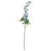 Artificial flower stem with blue flowers on a white background