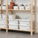 Wooden shelves with labelled SOCKERBIT boxes organising tools, seeds and games