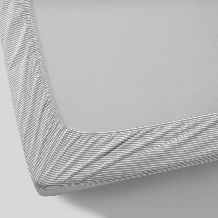 IKEA SOLFIBBLA grey cotton fitted sheet with all-around elastic edging displayed flat on white background