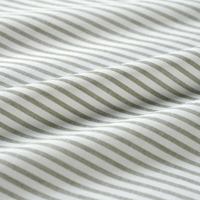 Close-up of IKEA SOLFIBBLA striped cotton flat sheet fabric showing weave and texture