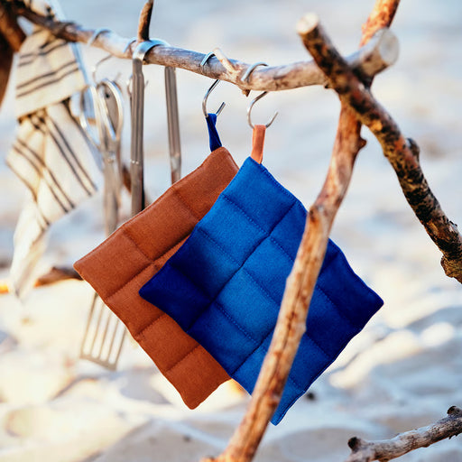 IKEA SOLUPPGÅNG blue pot holder 21x21cm close-up showing cotton linen texture and hanging loop