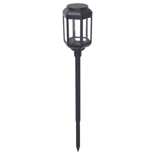 IKEA SOLVINDEN LED solar-powered ground stick in clear black lighting up a garden pathway-40514644