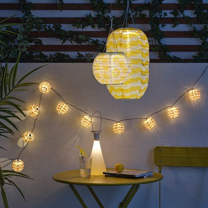 Compact yellow flower solar lighting solution for both indoor and outdoor spaces