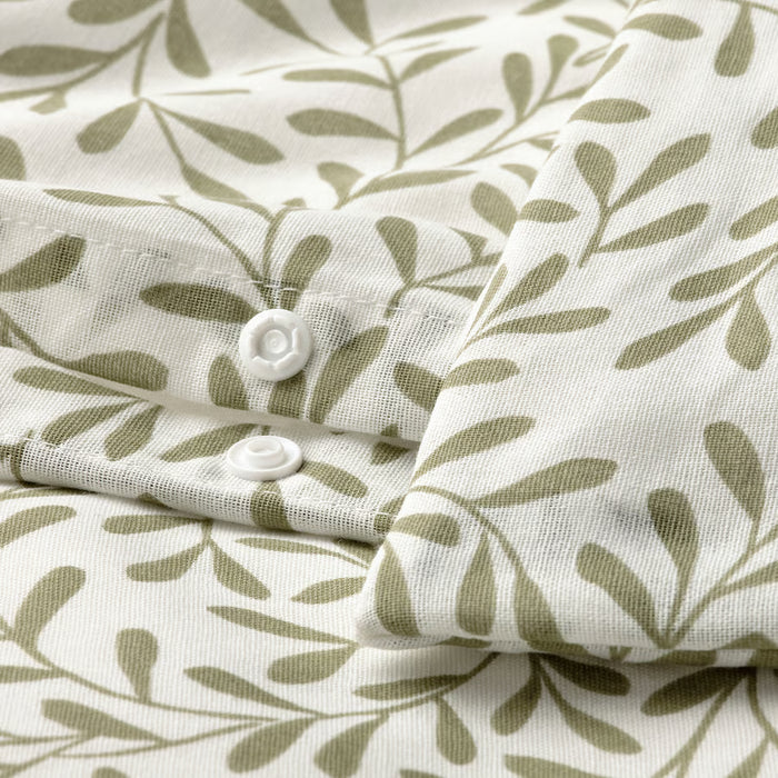 Close-up of IKEA SORGMANTEL duvet cover green leaf pattern with press-stud closure