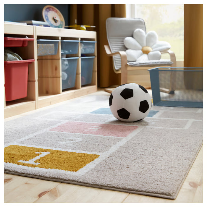 IKEA SPARKA soft toy football placed on white background showing full round shape
