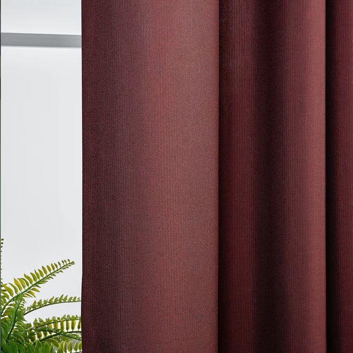 IKEA SPIRBJÖRNBÄR rich red curtains hanging full length on tall window blocking light