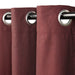 Close-up of IKEA SPIRBJÖRNBÄR burgundy curtain eyelet detail with silver grommet on curtain rod