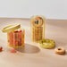  IKEA SPJUTLILJA transparent jars with yellow lids storing cookies and gummies on counter