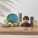 IKEA SPJUTLILJA jar set with yellow lids displaying dry goods on wooden table
