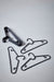 Close-up of IKEA SPRUTTIG black hanger hook and shoulder detail showing matte finish