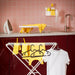 IKEA SPRUTTIG black hanger holding trousers showing non-slip grip